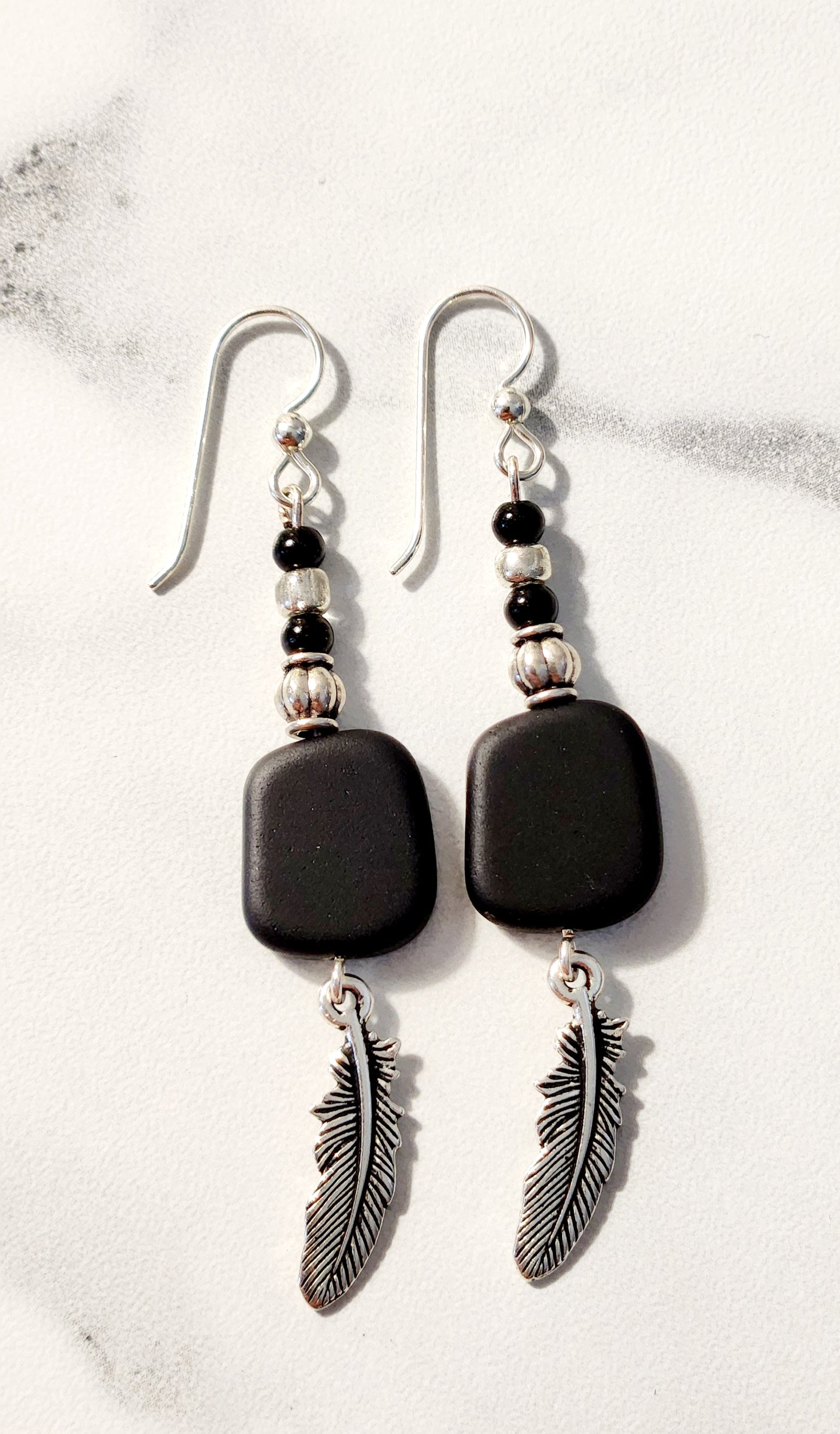 Black & Silver Sea glass feather earrings