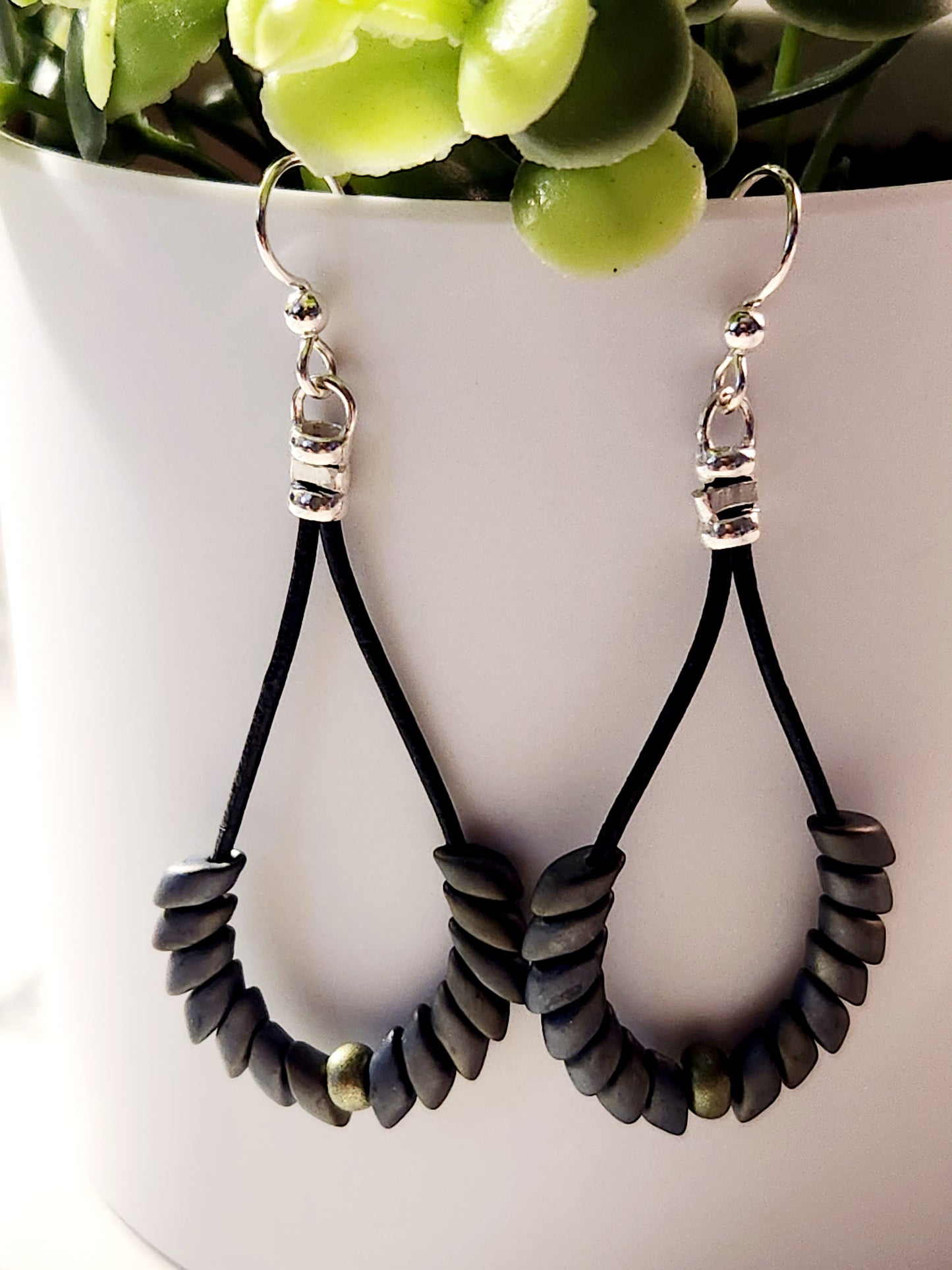 Gray Phonenix feather earrings