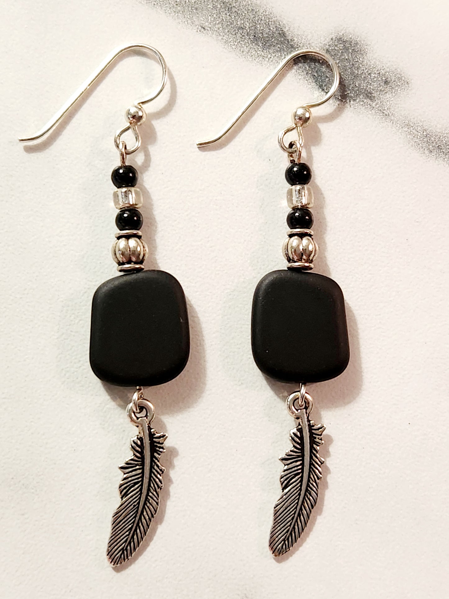 Black & Silver Sea glass feather earrings
