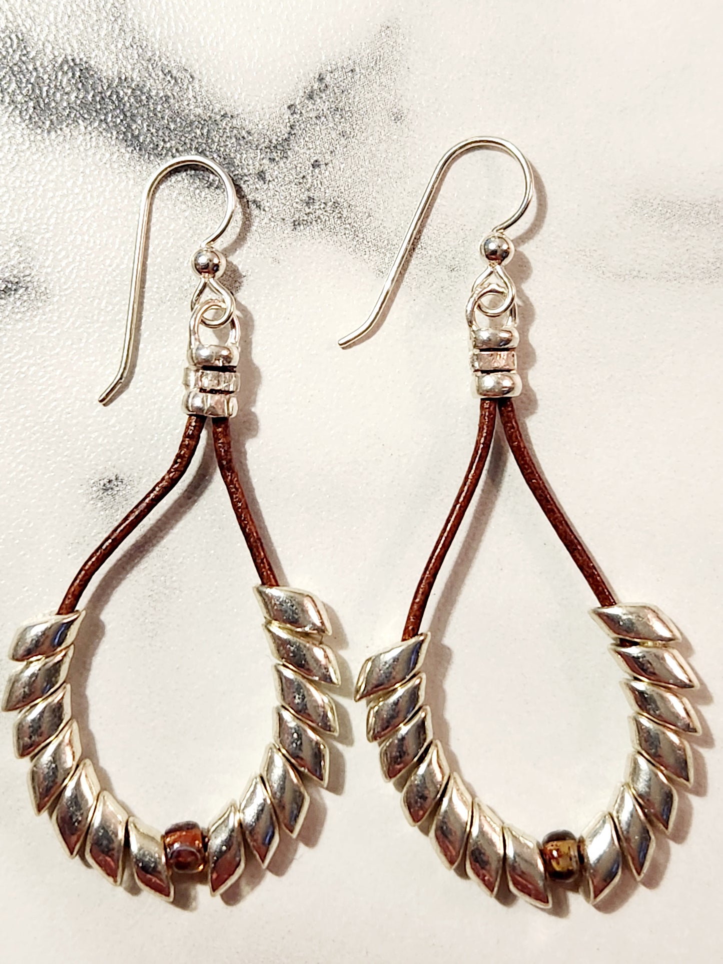 Metalic silver Pheonix feathers