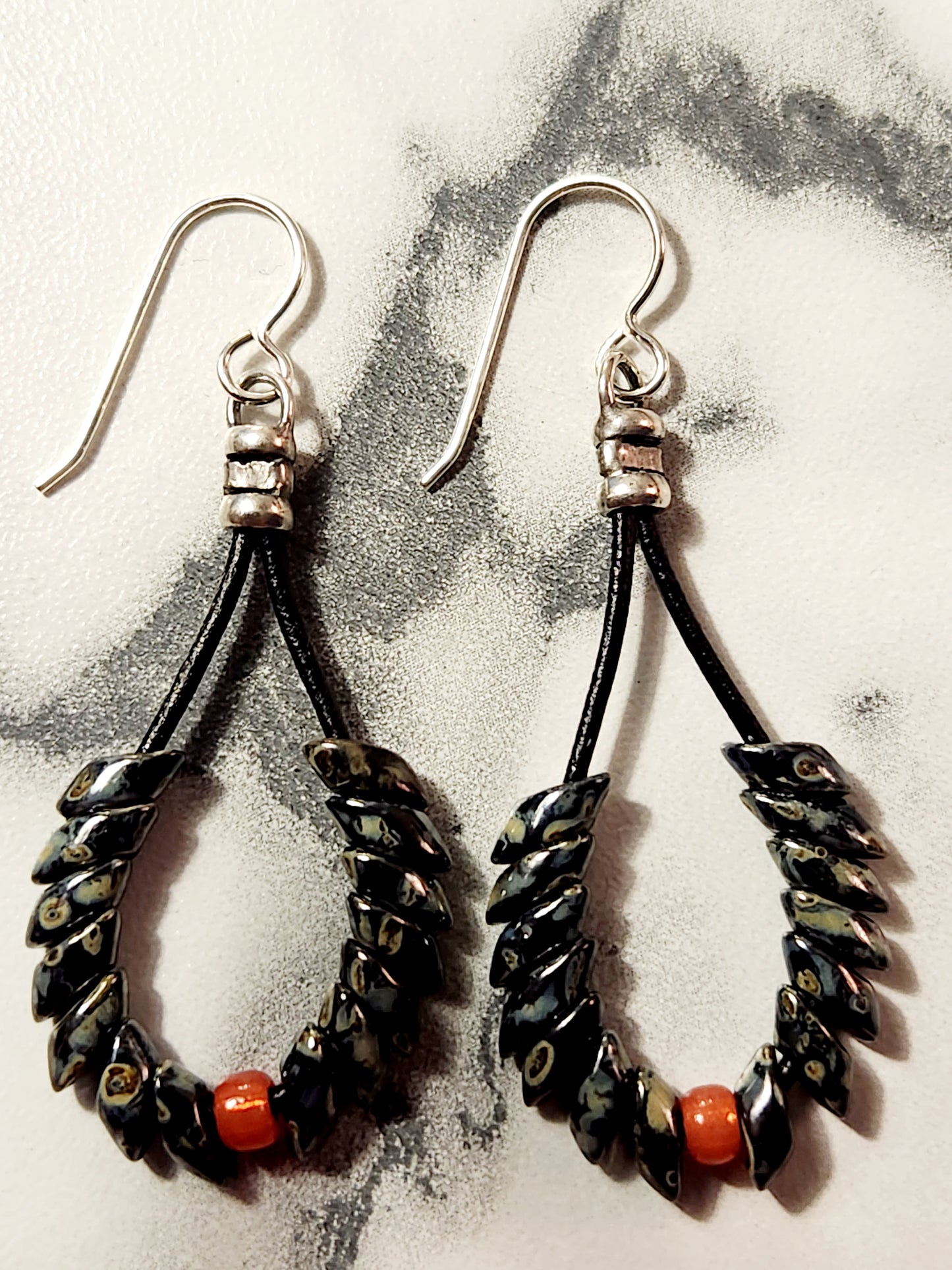 Black Picasso Phoenix feather earrings