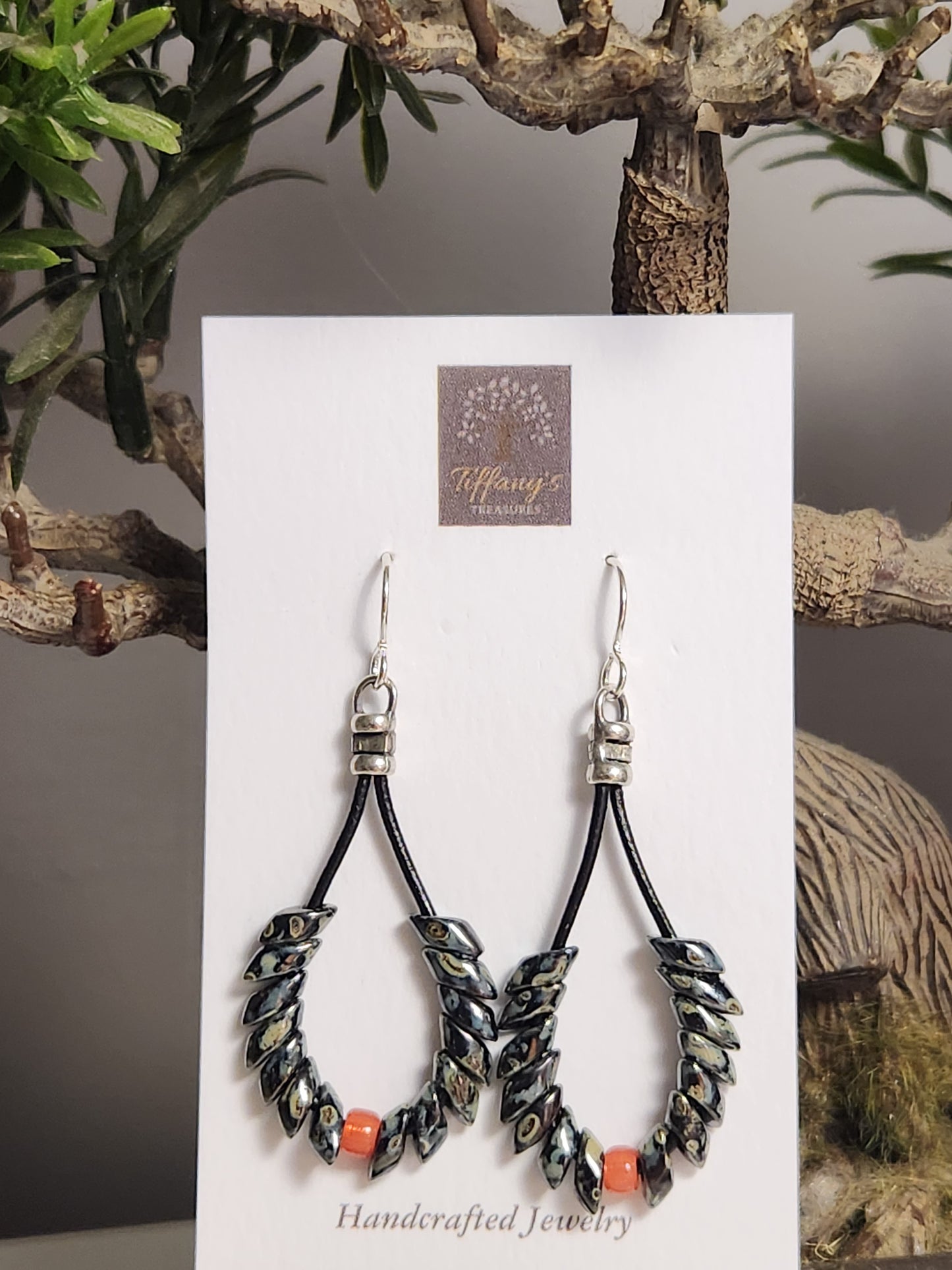 Black Picasso Phoenix feather earrings