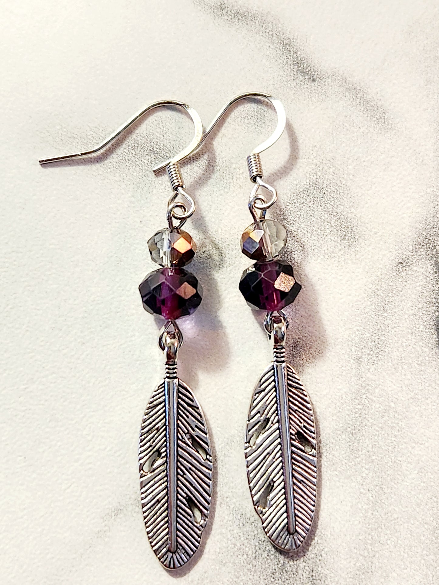 Plum feather earrings