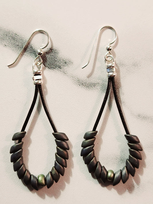 Gray Phonenix feather earrings