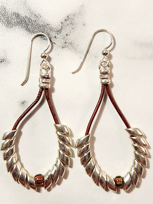 Metalic silver Pheonix feathers