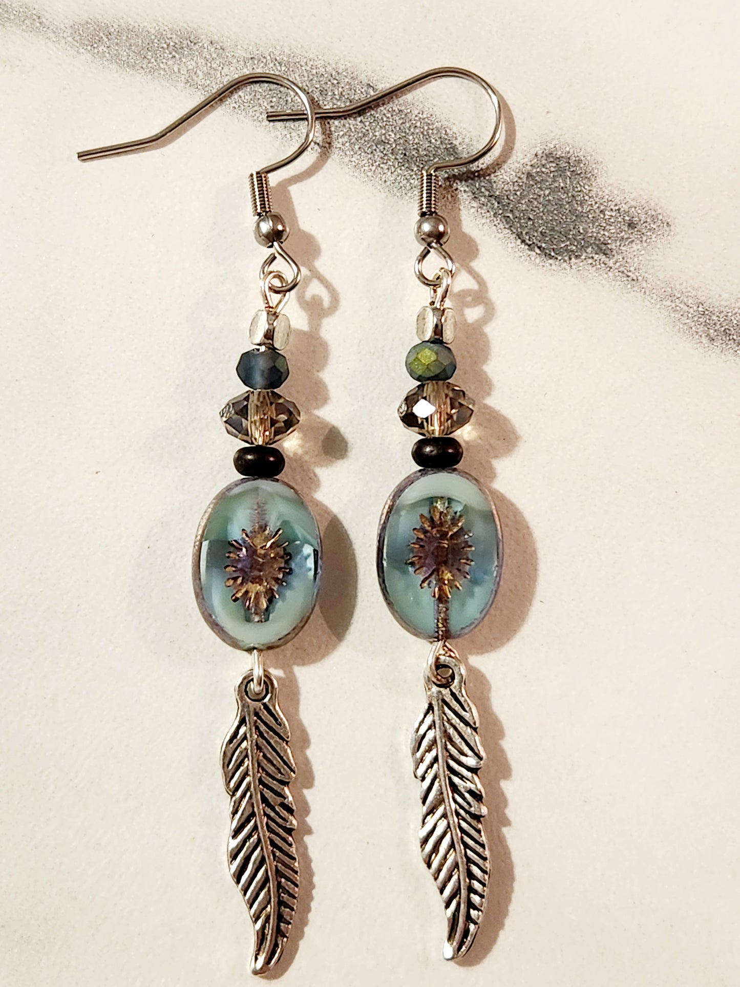 Mixed teal & feather earrings
