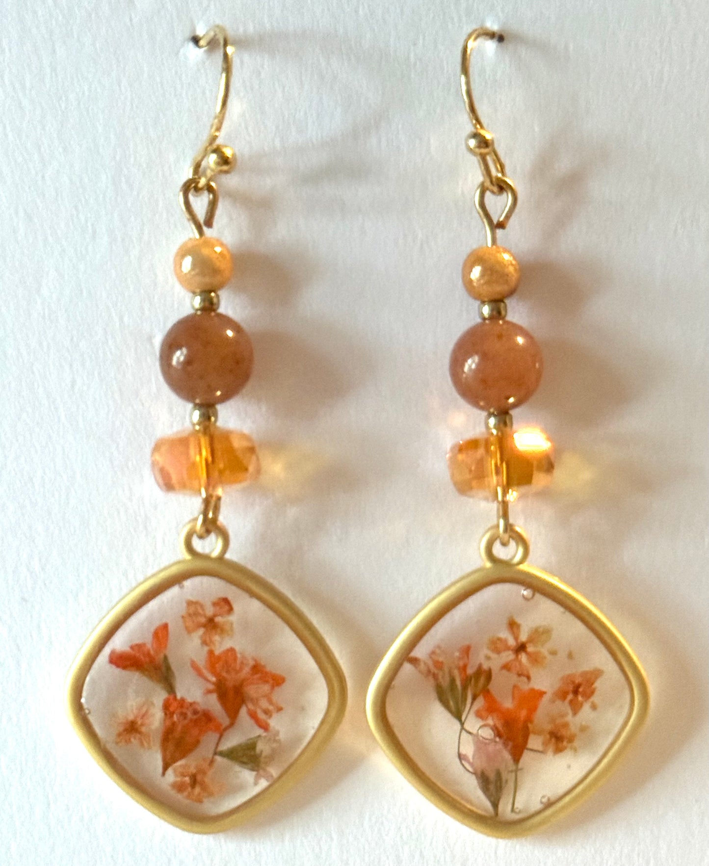 Golden amber resin earrings