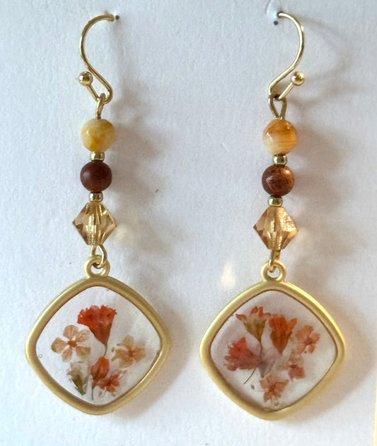 Gold and burnt orange resin earrings