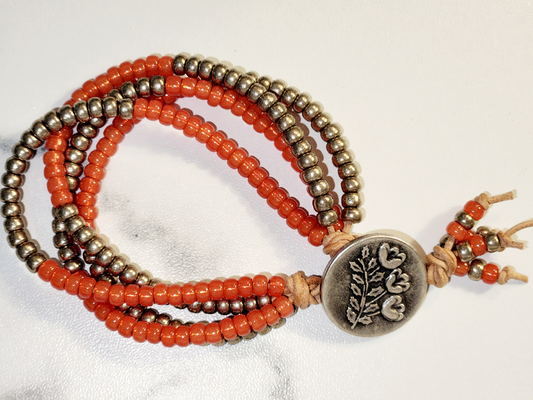 Orange button braclet